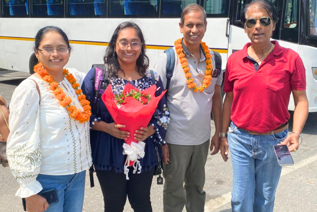 Harry, the Mathura Vrindavan tour guide, warmly welcoming guests at the airport, excited and happy to begin their spiritual journey to Mathura and Vrindavan.