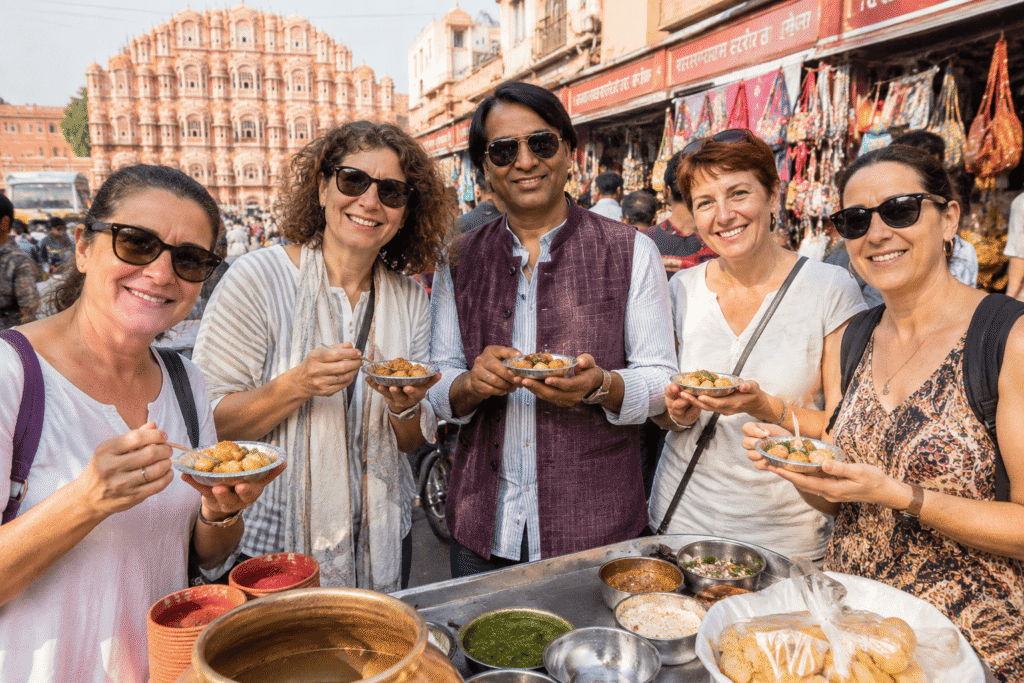 meaningful India travel stories with local guide and travelers in Jaipur enjoying street food 