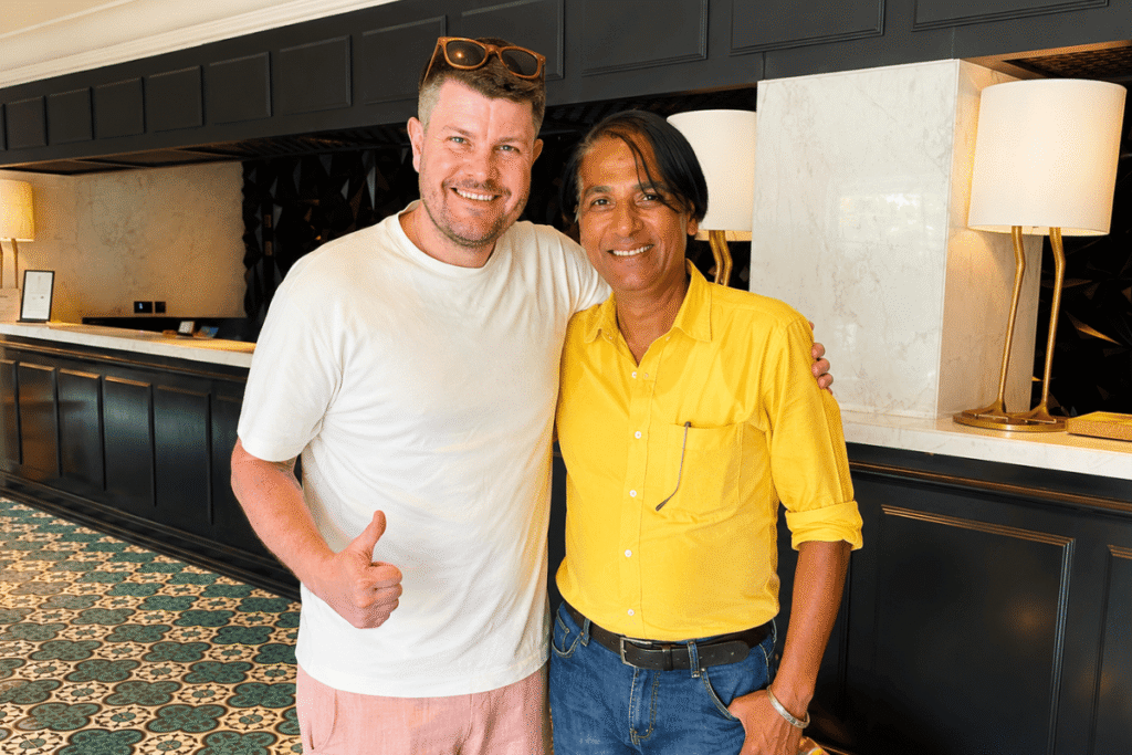 International traveler David from London with  his private Delhi tour guide Harry at hotel in new Delhi