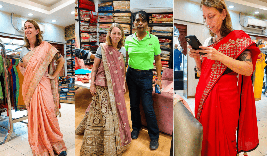 International visitor trying traditional Indian sarees during a private Delhi Shopping Tour.