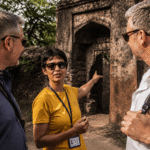 Licensed Delhi tour guide guiding travelers through a secret historical monument archway on a private hidden places in Delhi tour